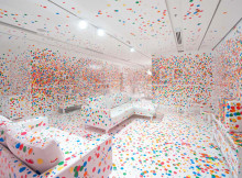 A white room, thousands of stickers, and thousands of children